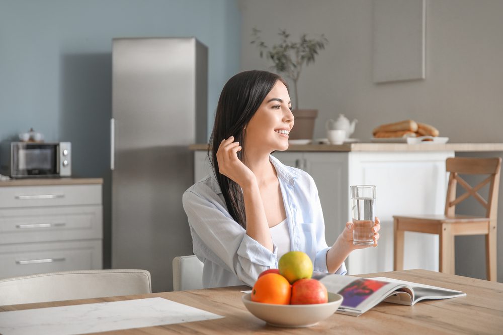Beautiful,Young,Woman,Drinking,Water,In,Kitchen Well Water testing And Inspection